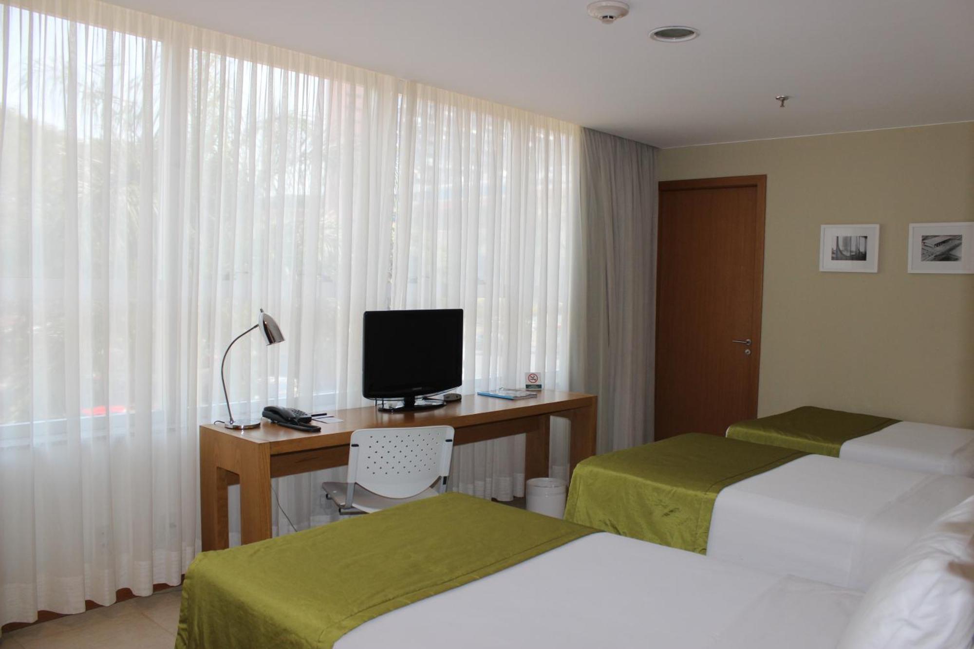 Quarto Triplo (3 Adultos)